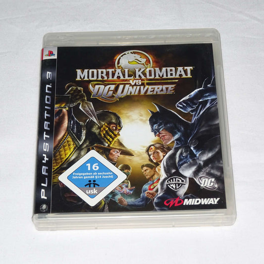 PS3 game case for "Mortal Kombat vs DC Universe" featuring characters from both franchises, used condition.