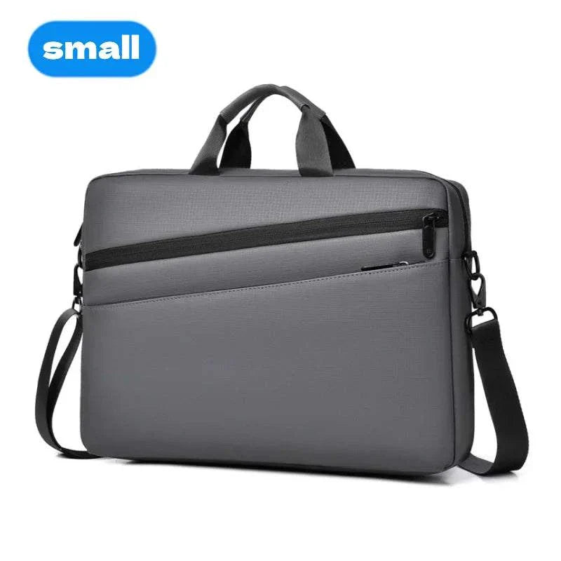 Elegant gray laptop bag with adjustable shoulder strap for 15.6-17.3 inch laptops.
