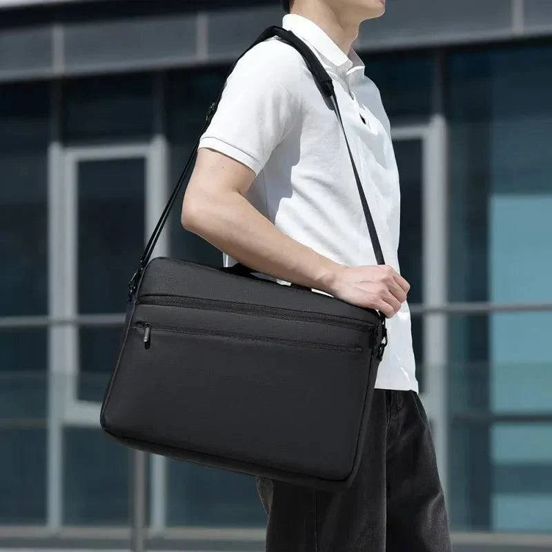 Elegant black business laptop shoulder bag for men, suitable for 15.6-17.3 inch laptops.